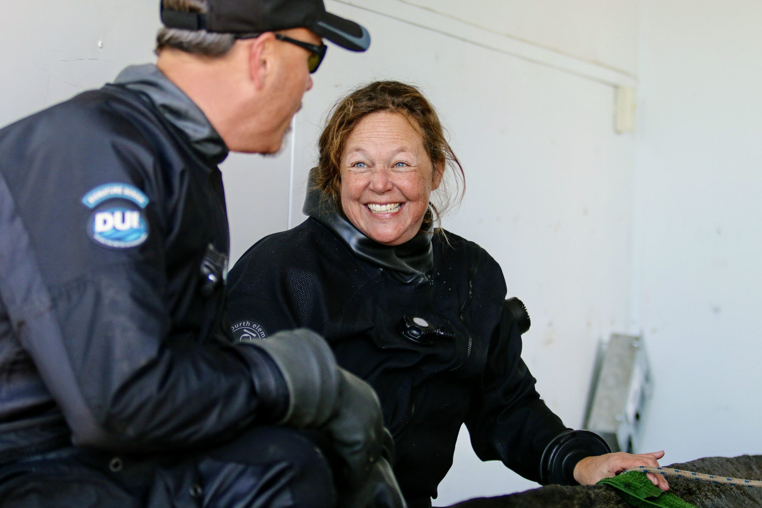 Maritime archaeologist Tamara Thomsen smiles in wet suit