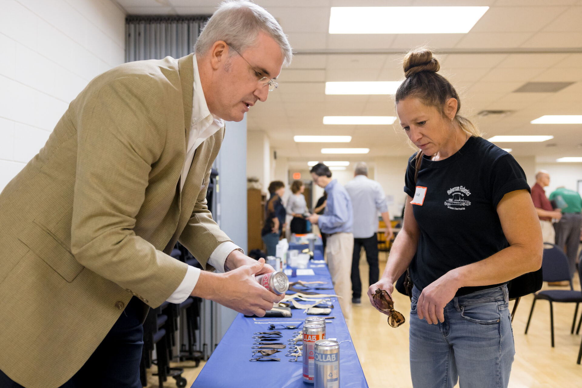 GSGP Executive Director David Naftzger hands a participant an Icelandic energy drink made with fish collagen. Photo: Front Room Studios